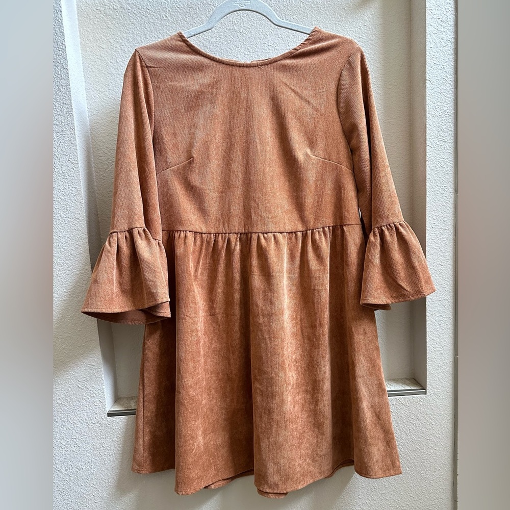 Corduroy mini dress, relaxed fit, scoop neckline, 3/4 bell sleeves.
